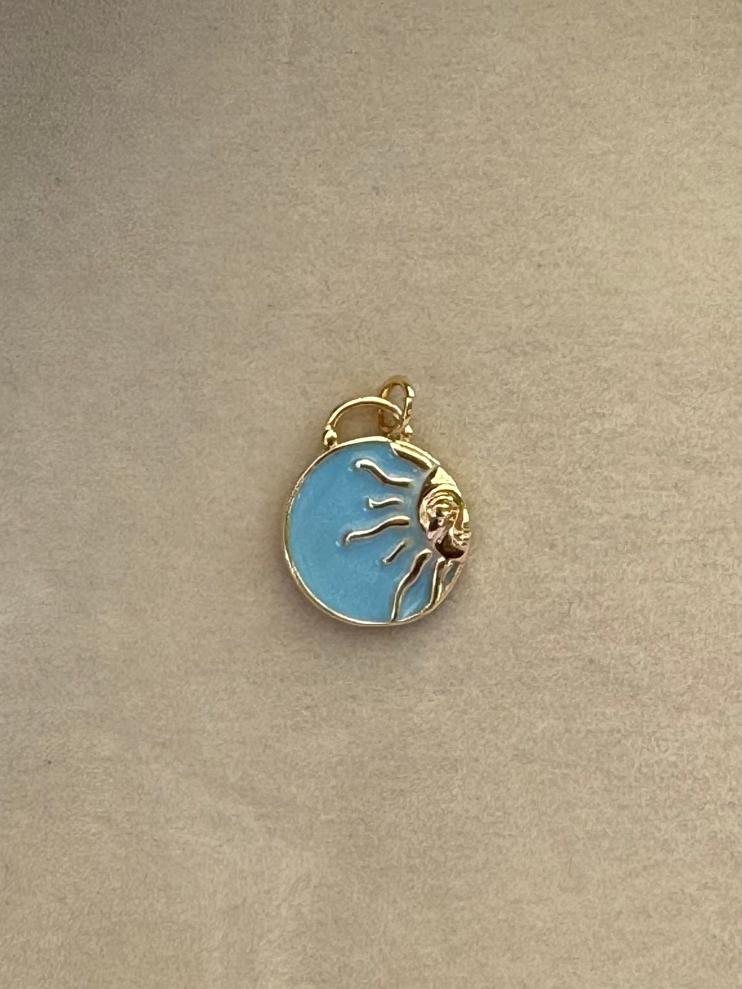 Blue sun charm