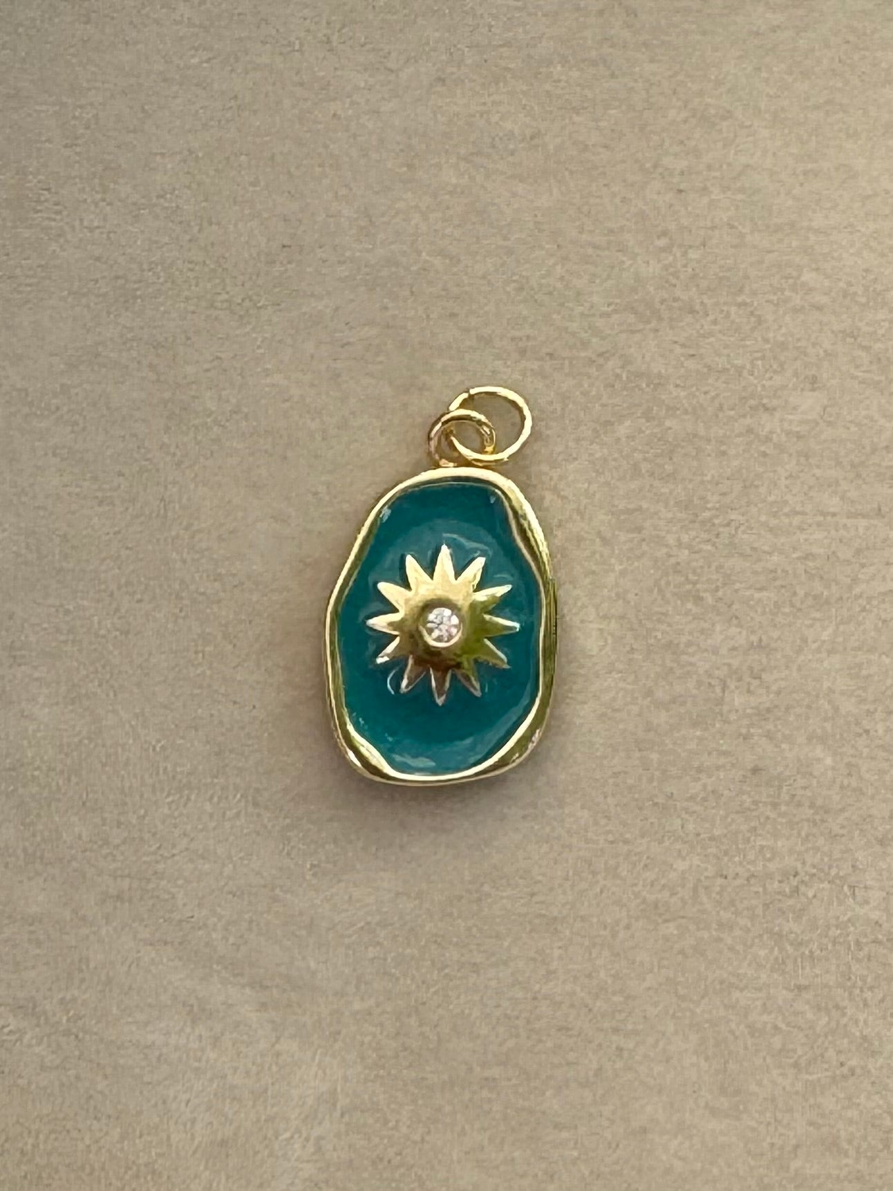 Sun burst charm