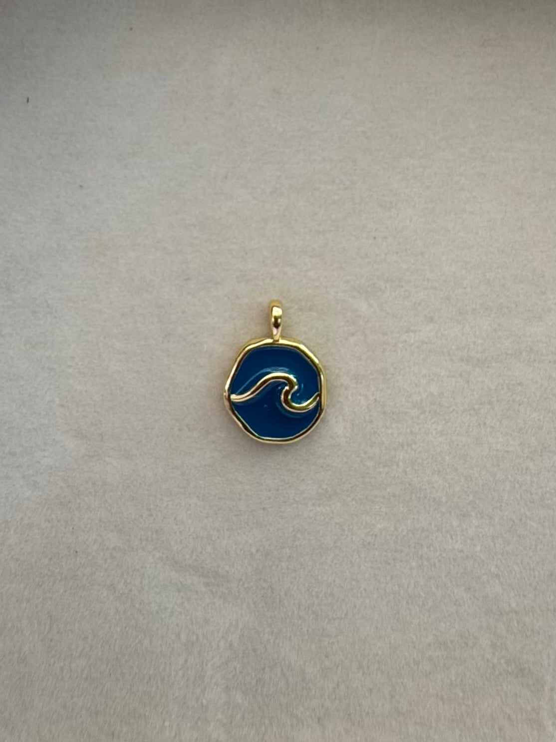 Blue wave charm