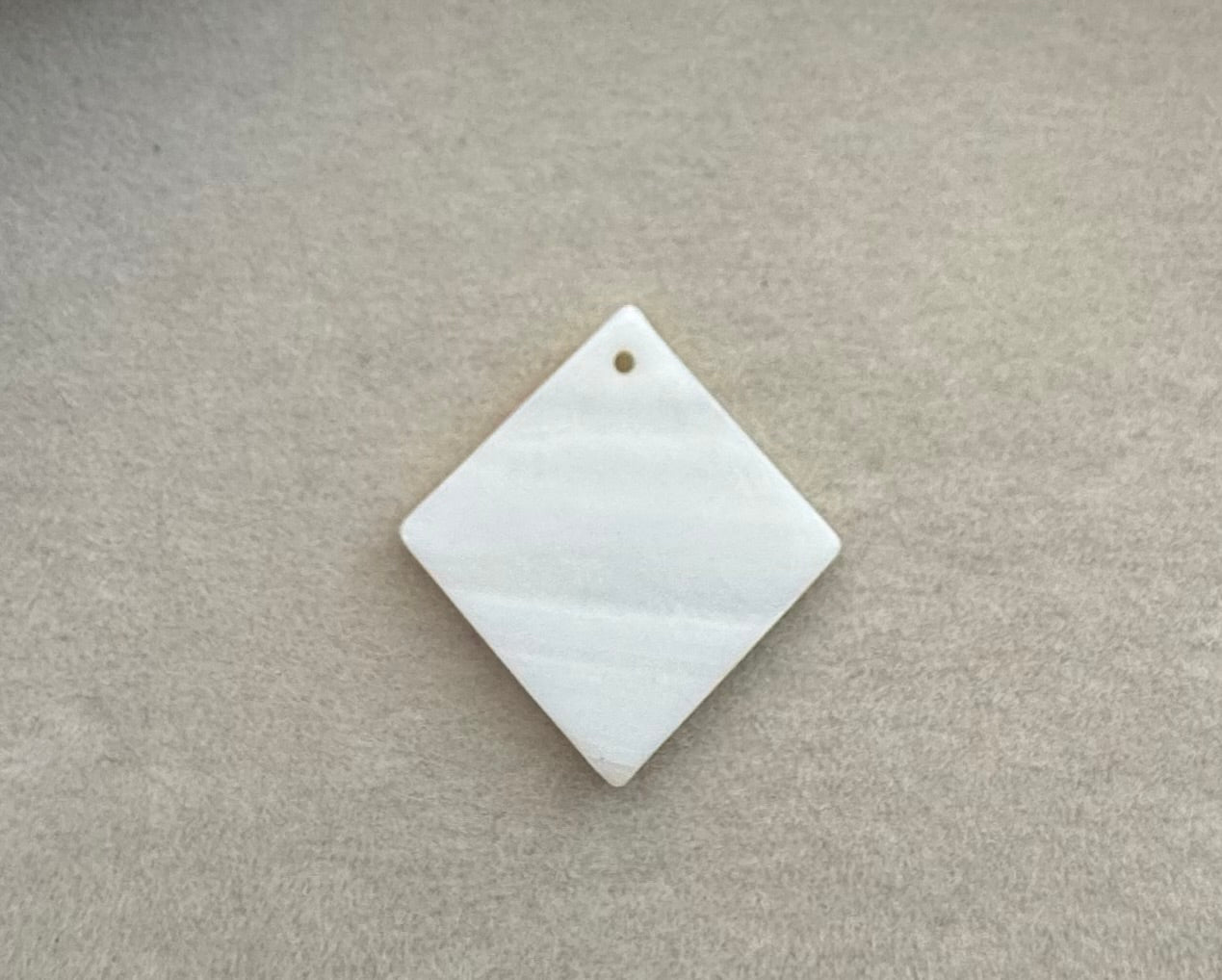 Mother of pearl charm