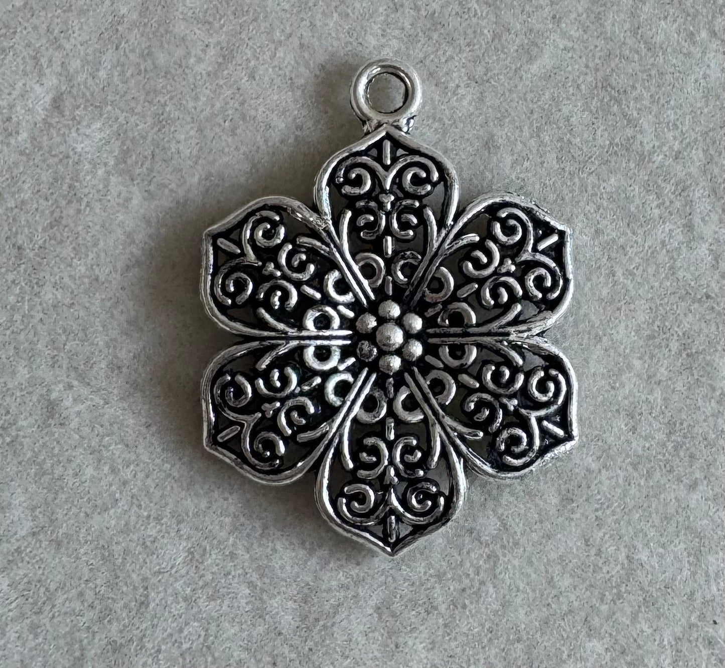 Silver floral charm