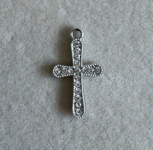 Silver cross embezzlers charm